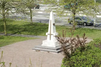 a white monument in the middle of a park at Hotel Italia in Zelzate