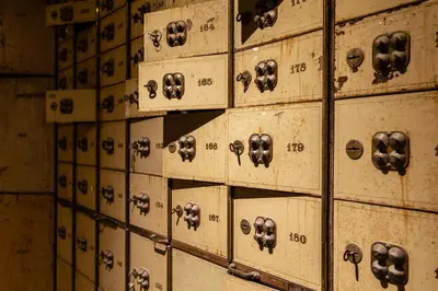 a wall of lockers withothletters and numbers on them at Hotel FRANQ in Antwerp