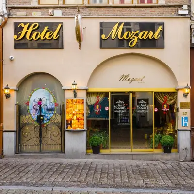 a store front of a hotel on a street at Hotel Mozart in Brussels