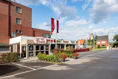 a street scene of a fast food restaurant at Vivaldi Hotel in Westerlo