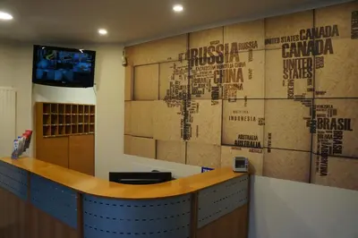 an office with a wall with a map on it at Hotel Evergreen in Brussels