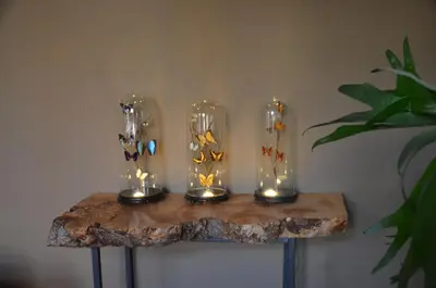 three glass vases sitting on top of a table at B&B De Vrome Vos in Mechelen