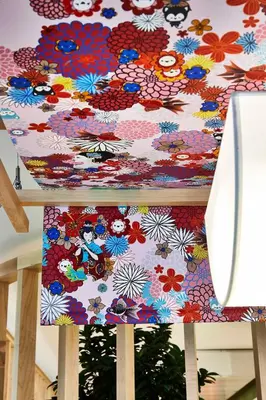 a table with a flower pattern on it at Yadoya Hotel in Brussels