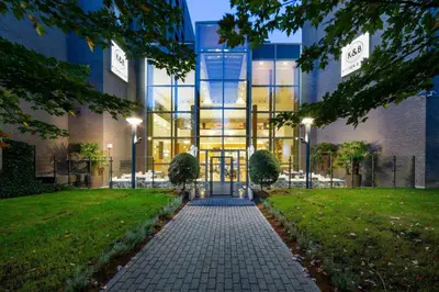 a building with a walkway in front of it at Courtyard By Marriott Brussels in Brussels