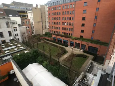 an aerial view of a building in a city at Parlamentarium apartment in Brussels