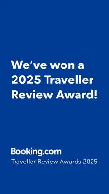 a blue sign that says weve won a traveler review award at B&B Aalsters-genot in Aalst