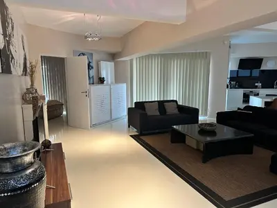 a living room with a couch and a table at Beautiful LOFT in the Center of Brussels in Brussels