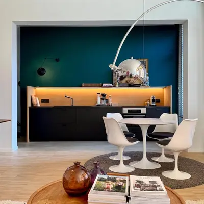 a living room with a table and chairs at Great to stay Gent I rooms & apartments in Ghent