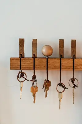 a bunch of keys hanging from a wooden shelf at Great to stay Gent I rooms & apartments in Ghent