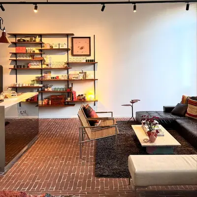 a living room with a couch and a table at Great to stay Gent I rooms & apartments in Ghent