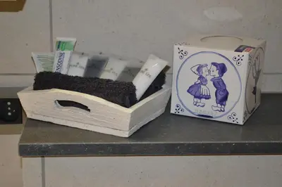 a box of toothbrushes and a box of a box at B&B 't Heirweggoed in Assenede