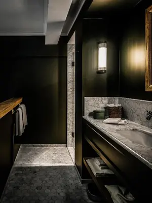 a bathroom with a sink and a bath tub at 1898 The Post in Ghent