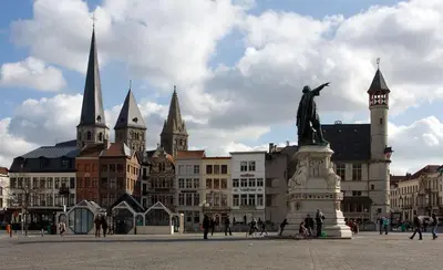 a city with a statue in front of a building at Lord of Ghent in Ghent