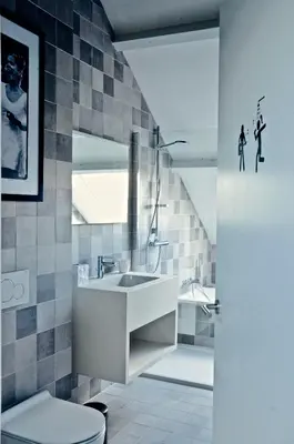 a bathroom with a sink and a toilet at Rock Lobster City Lodge in Antwerp