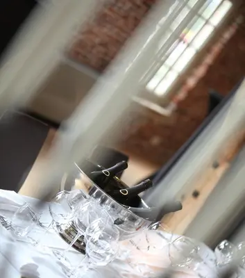a bunch of wine glasses sitting on a table at 'S Hertogenmolens Hotel in Aarschot