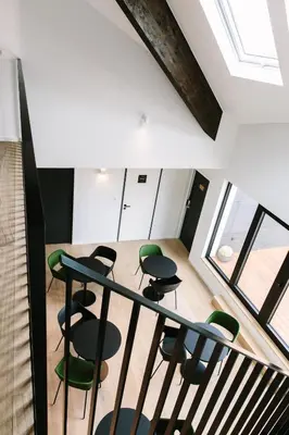 an overhead view of a room with chairs and tables at TRUST Hotel in Beveren