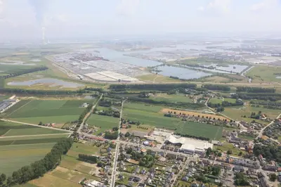 an aerial view of a city and a river at TRUST Hotel in Beveren