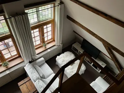 an overhead view of a living room with two windows at De Waterzooi Suites in Ghent