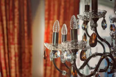 a chandelier with many glassidentsternessternessomalyomaly at B&B Stillant in Gierle