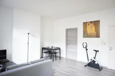 a living room with a couch and a table at Apartments Berlaymont OHY in Brussels
