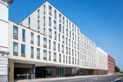 an office building on a city street at ibis budget Gent Centrum Dampoort in Ghent