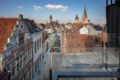 a view of a city from the roof of a building at Snooz Ap Holiday & Business Flats in Ghent
