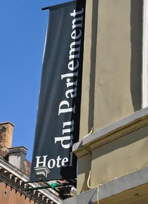 a sign for a hotel on the side of a building at Hotel Du Parlement in Brussels