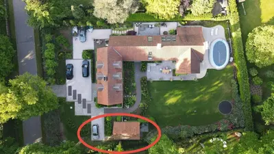 an aerial view of a house with a red circle at B&B Goudvink in Schilde