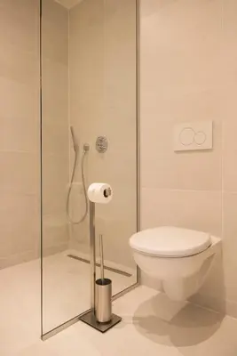 a bathroom with a toilet and a shower at Atelier 24 in Sint-Pieters-Leeuw