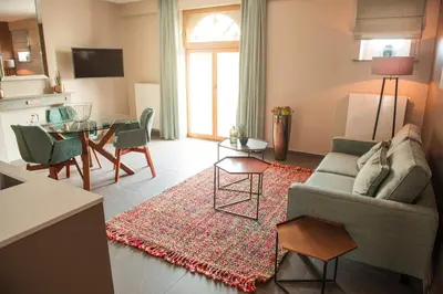 a living room with a couch and a table at Atelier 24 in Sint-Pieters-Leeuw