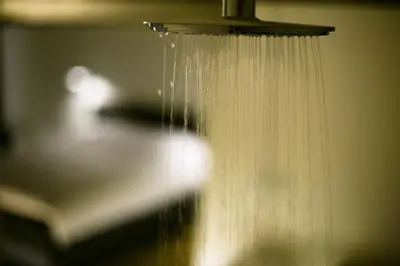 a stream of water coming out of a shower at B&B Yellow Submarine in Antwerp