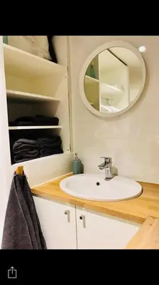a bathroom with a sink and a mirror at Your suite Ghent in Ghent
