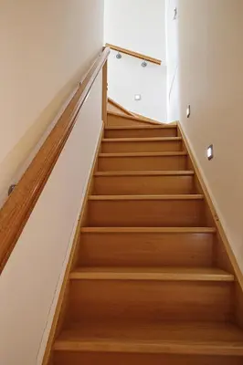a staircase in a house with wooden stairs at B&B Le Lys d'or in Brussels