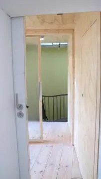 an open door to a room in a house at Huize Maeterlinck in Ghent