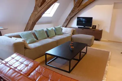 a living room with a couch and a coffee table at Living The Dream in Ghent
