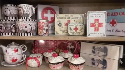 a shelf with a bunch of items on it at B&B Bon-Bon 'nuit' in Turnhout