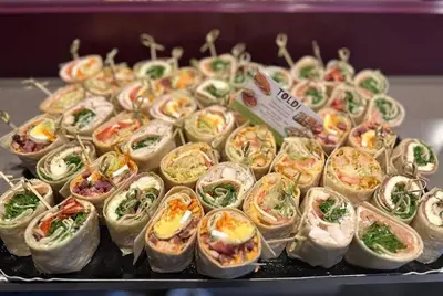 a bunch of food in plastic containers on a tray at Private Studio Brussels Airport in Brussels