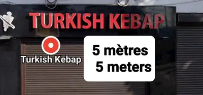 a sign for a tukkish kebab and meters at Private Studio Brussels Airport in Brussels