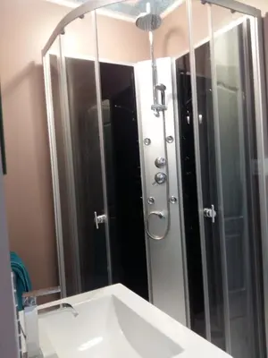 a bathroom with a shower and a white sink at Private Studio Brussels Airport in Brussels
