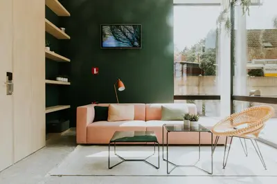 a living room with a couch and a table at Hotel Jerom in Kalmthout