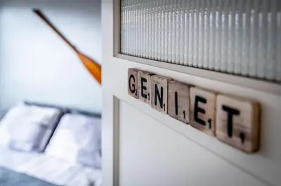 a sign on a door with the word teenager written on it at B&B 1 uit de 100 in Ghent