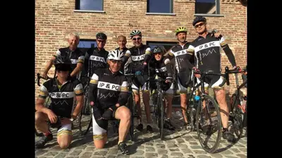 a group of people posing for a picture with their bikes at Constantinus in Herzele