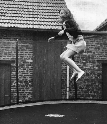 a woman is jumping on a trampoline at Constantinus in Herzele