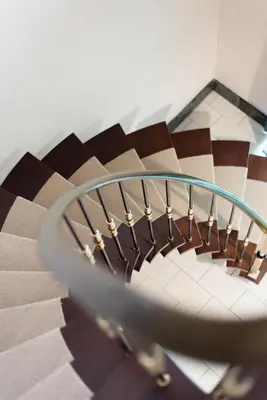 a close up of a spiral stair case at Lovely Guesthouse Lier in Lint