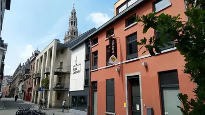 a row of buildings on a city street at Leuven City Hostel in Leuven