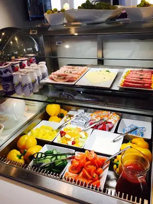 a buffet line with many different types of food at BEST WESTERN Hotel Brussels South in Ruisbroek