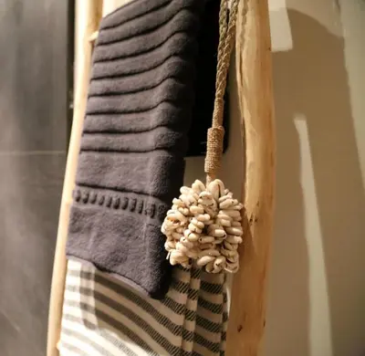 a bunch of towels hanging on a rack with a towel at AuxiliumWellness Get Back to Serenity in Grobbendonk