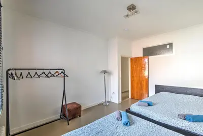 a bedroom with two beds in a room at The Meir Lodge. Apartments in heart of Antwerp in Antwerp