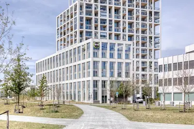 an architectural rendering of a tall white building at B&B HOTEL Antwerpen Zuid in Antwerp