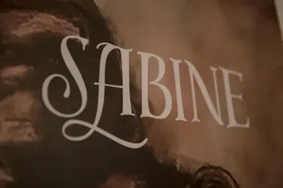 a close up of the word shine written on a wall at Antonine's Atelier in Hingene